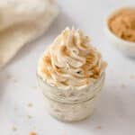 A mason jar filled with brown sugar whipped and sprinkled with brown sugar.