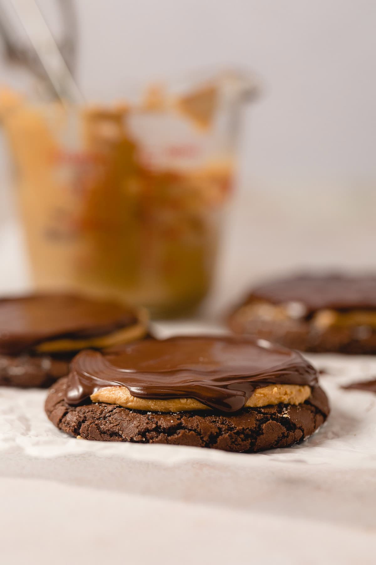 Buckeye Brownie cookie with peanut butter topping and smooth chocolate ganache.
