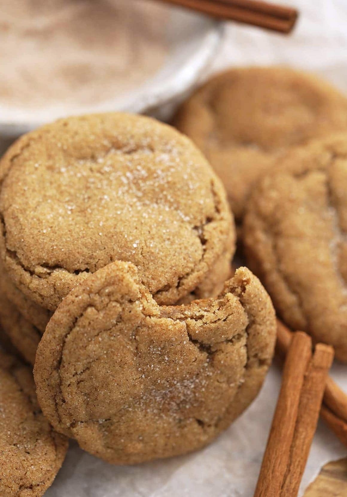 Cinnamon apple cookies with a bite removed.
